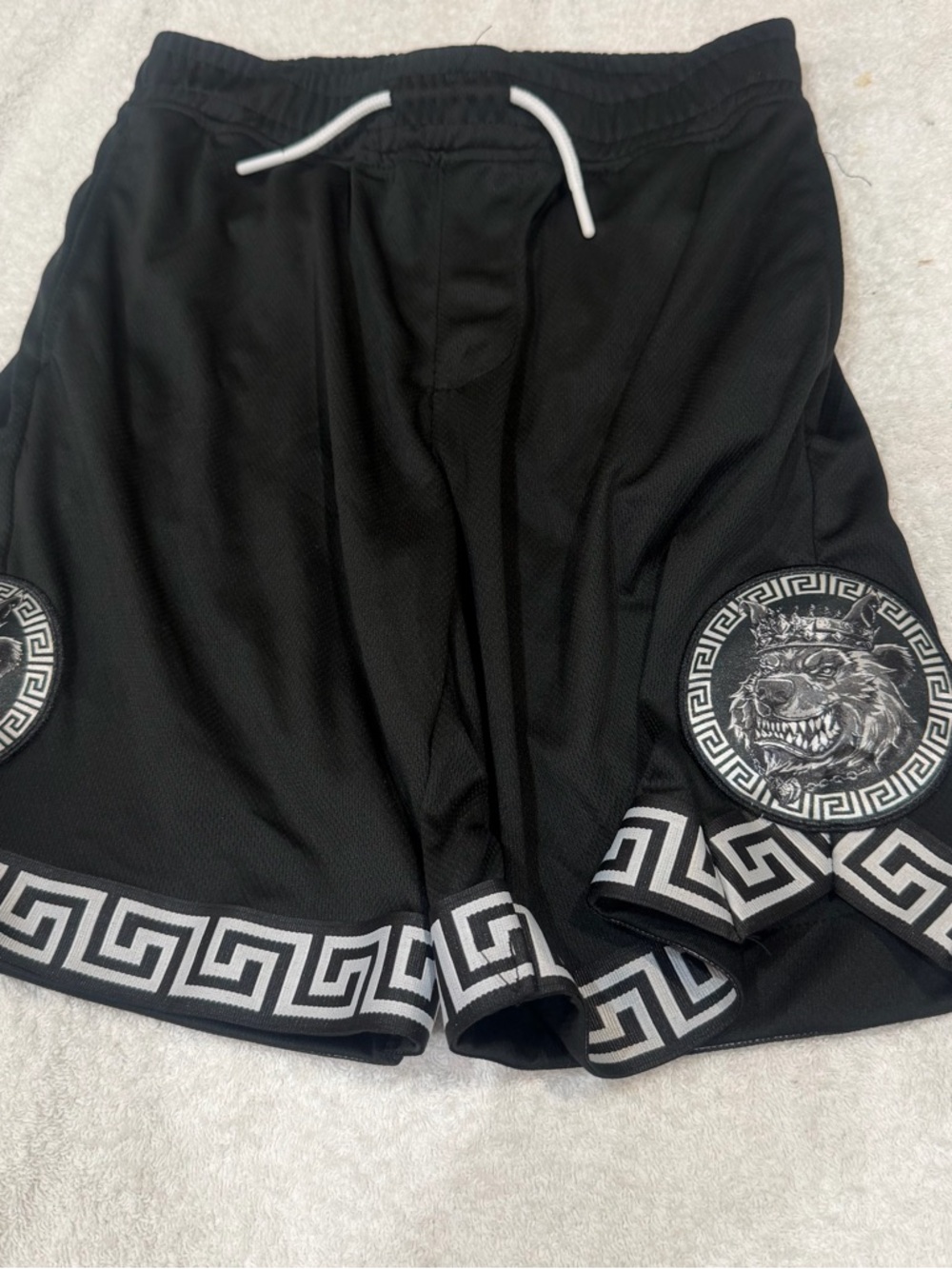 Black Boys Athletic Mesh Shorts with White Trim and Graphic Medallions
